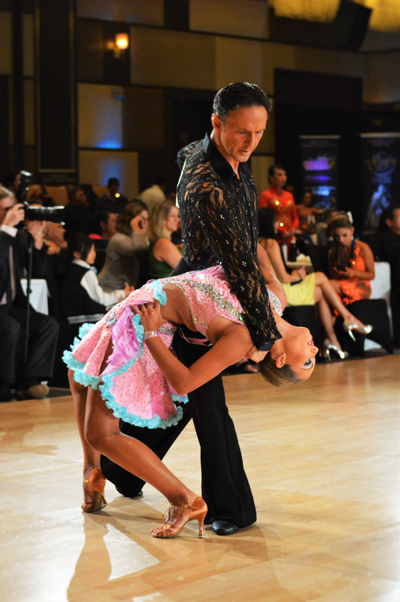 Competitive Latin dancers performing a dip at Eurorhythm Dance Studio in Scottsdale